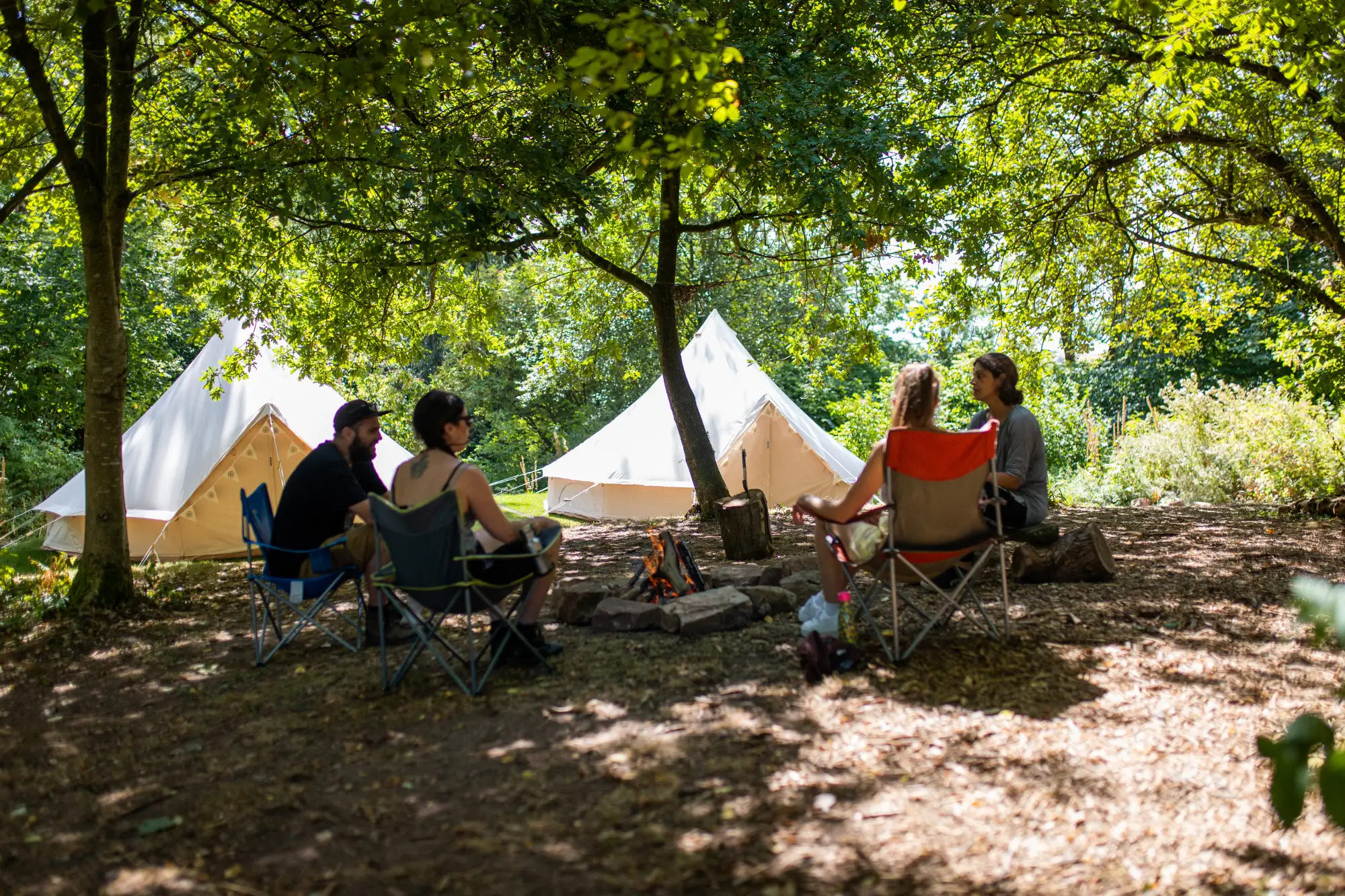 Bell tent campers enjoying themselves